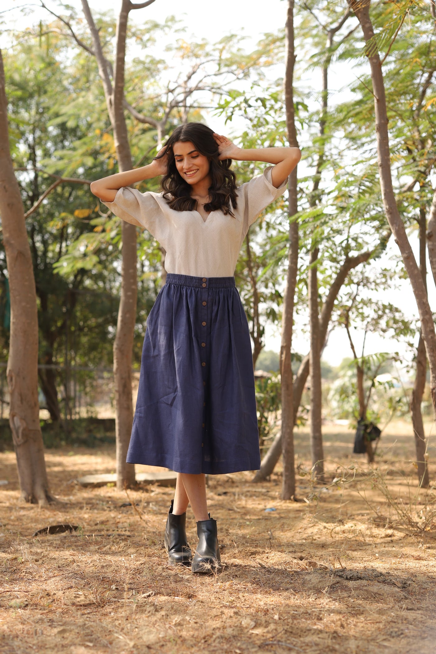 Navy gathered linen midi skirt in washed linen, photographed in Jaipur
