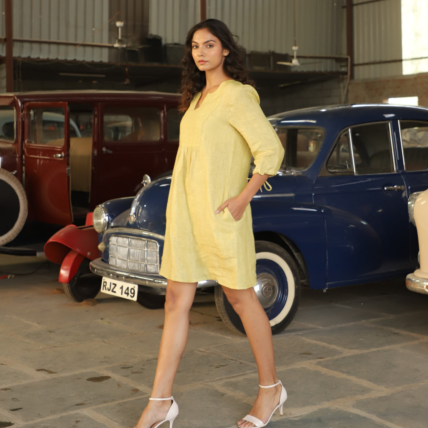 Chartreuse gathered yoke linen dress in washed linen, photographed in Jaipur