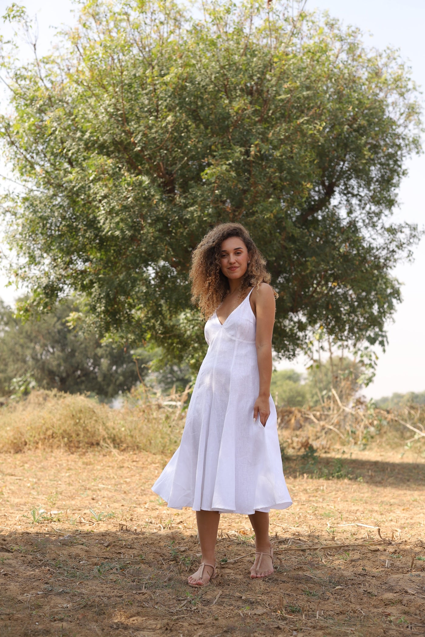 White strappy linen sundress in washed linen, photographed in Jaipur