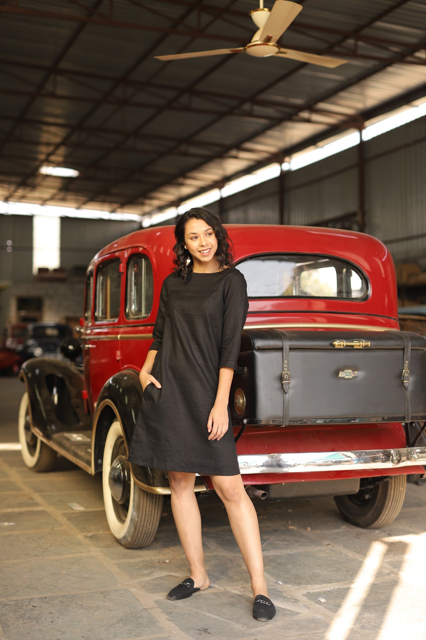 Charcoal sleeveless linen shift dress in washed linen, photographed in Jaipur