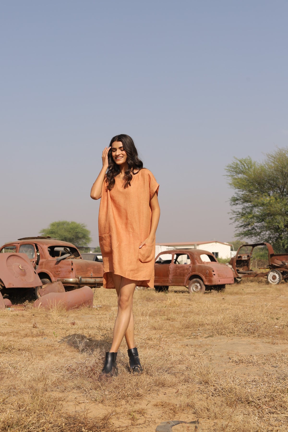 Apricot boxy linen shift in washed linen, photographed in Jaipur