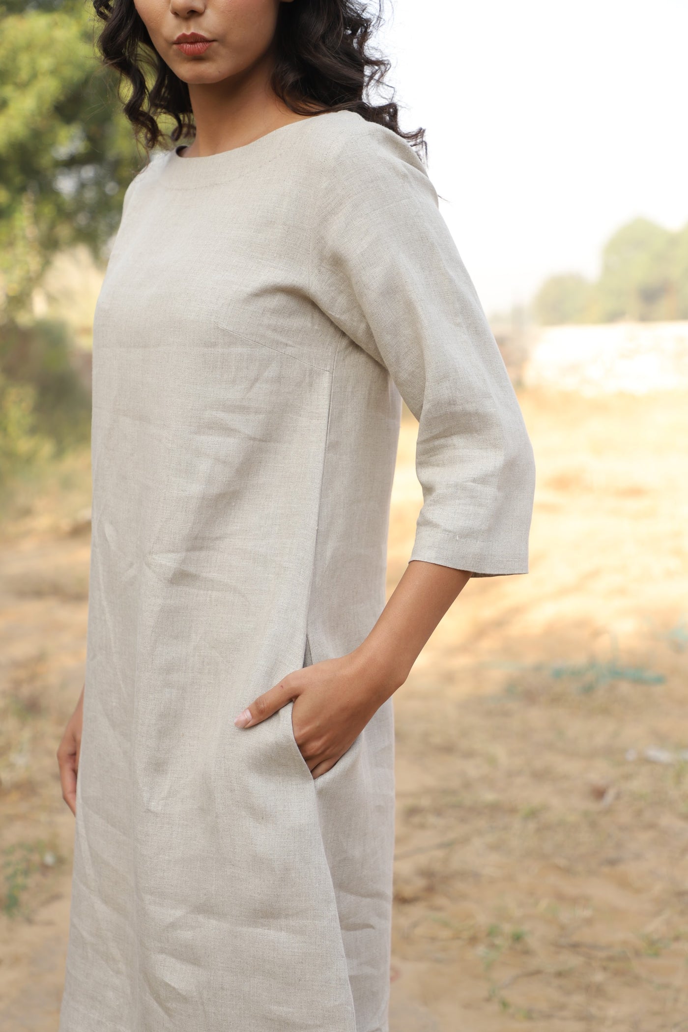 Oatmeal boat neck linen shift in washed linen, photographed in Jaipur