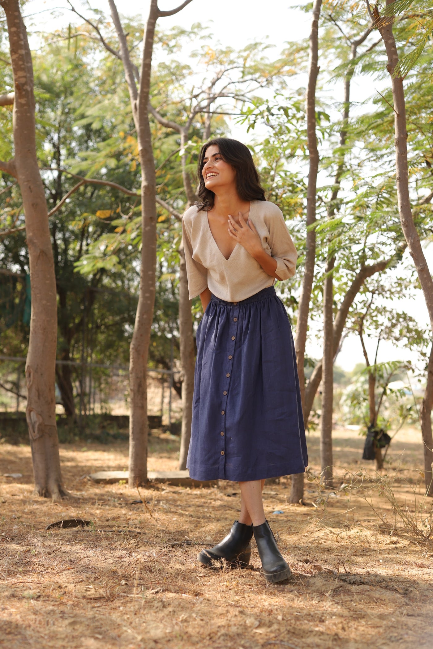 Navy gathered linen midi skirt in washed linen, photographed in Jaipur