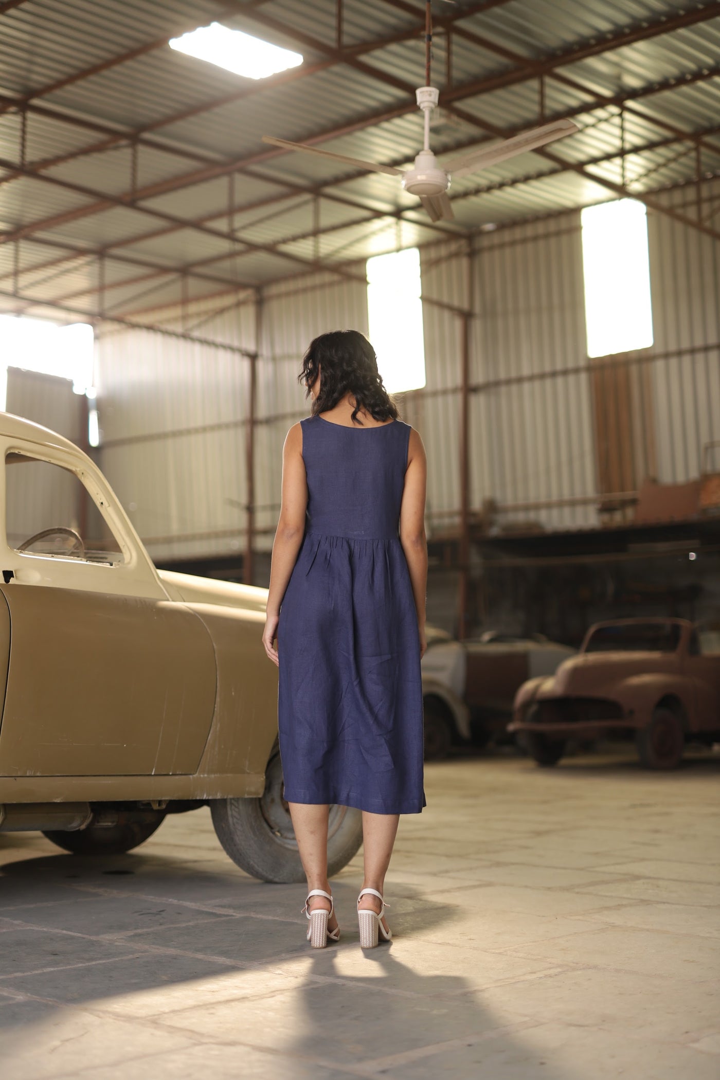 Navy button front gathered midi in washed linen, photographed in Jaipur