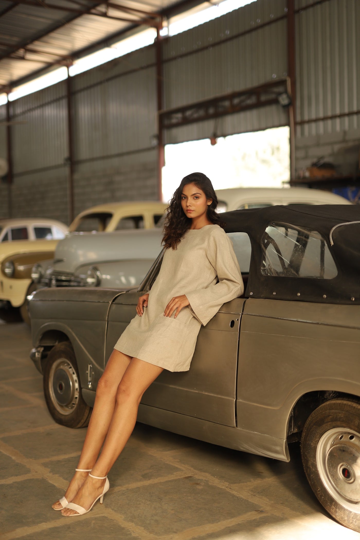 Sand oversized linen mini dress in washed linen, photographed in Jaipur