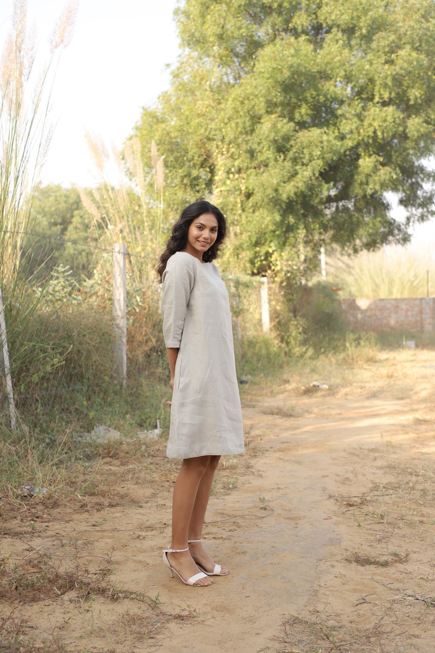 Oatmeal boat neck linen shift in washed linen, photographed in Jaipur