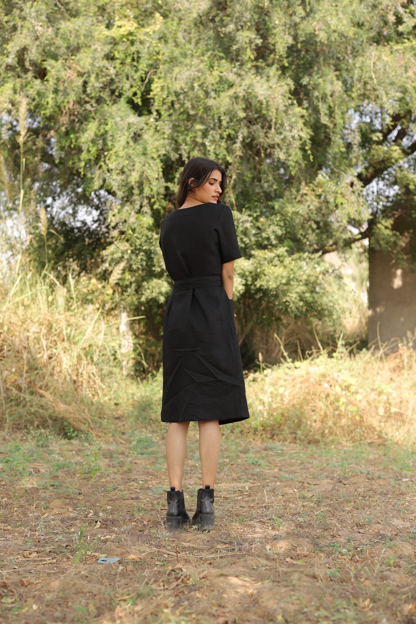Black belted button front midi in washed linen, photographed in Jaipur