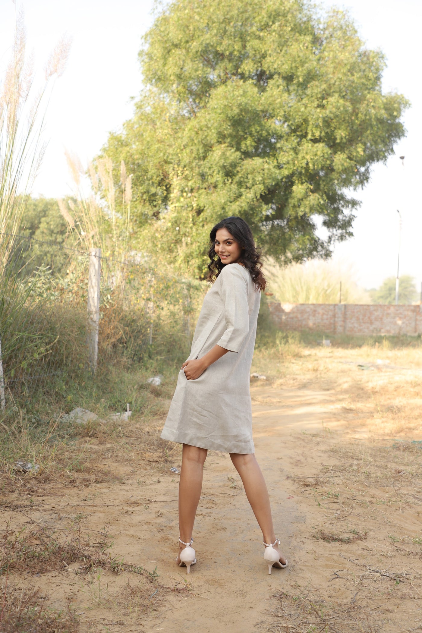 Oatmeal boat neck linen shift in washed linen, photographed in Jaipur
