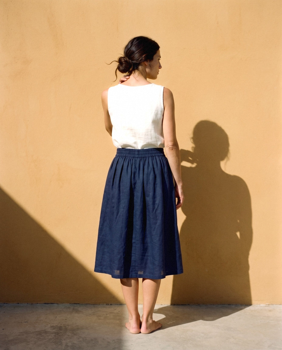 Gathered Linen Midi Skirt in navy, back view