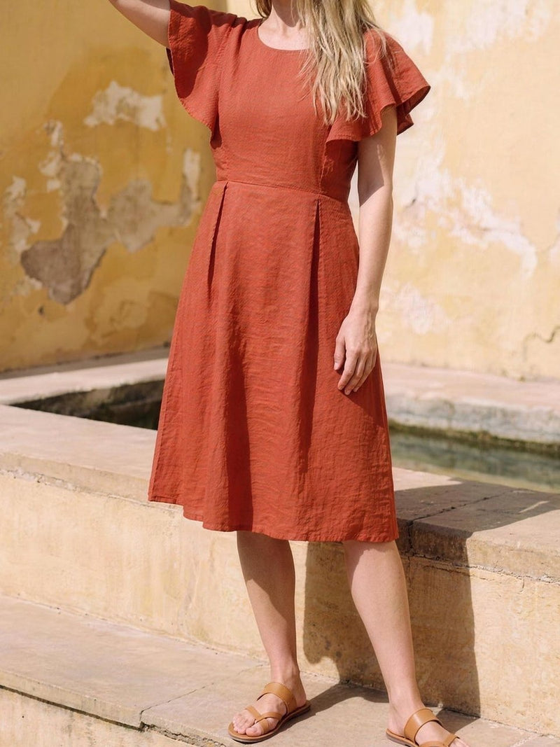 Frill Sleeve Linen Dress in rust, photographed in Jaipur