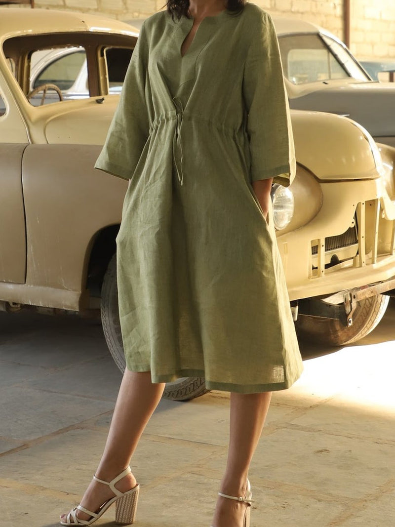 Olive kimono sleeve linen dress in washed linen, photographed in Jaipur