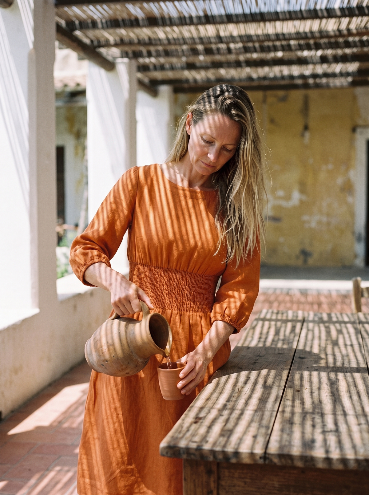 Boat Neck Smocked Linen Dress in orange linen