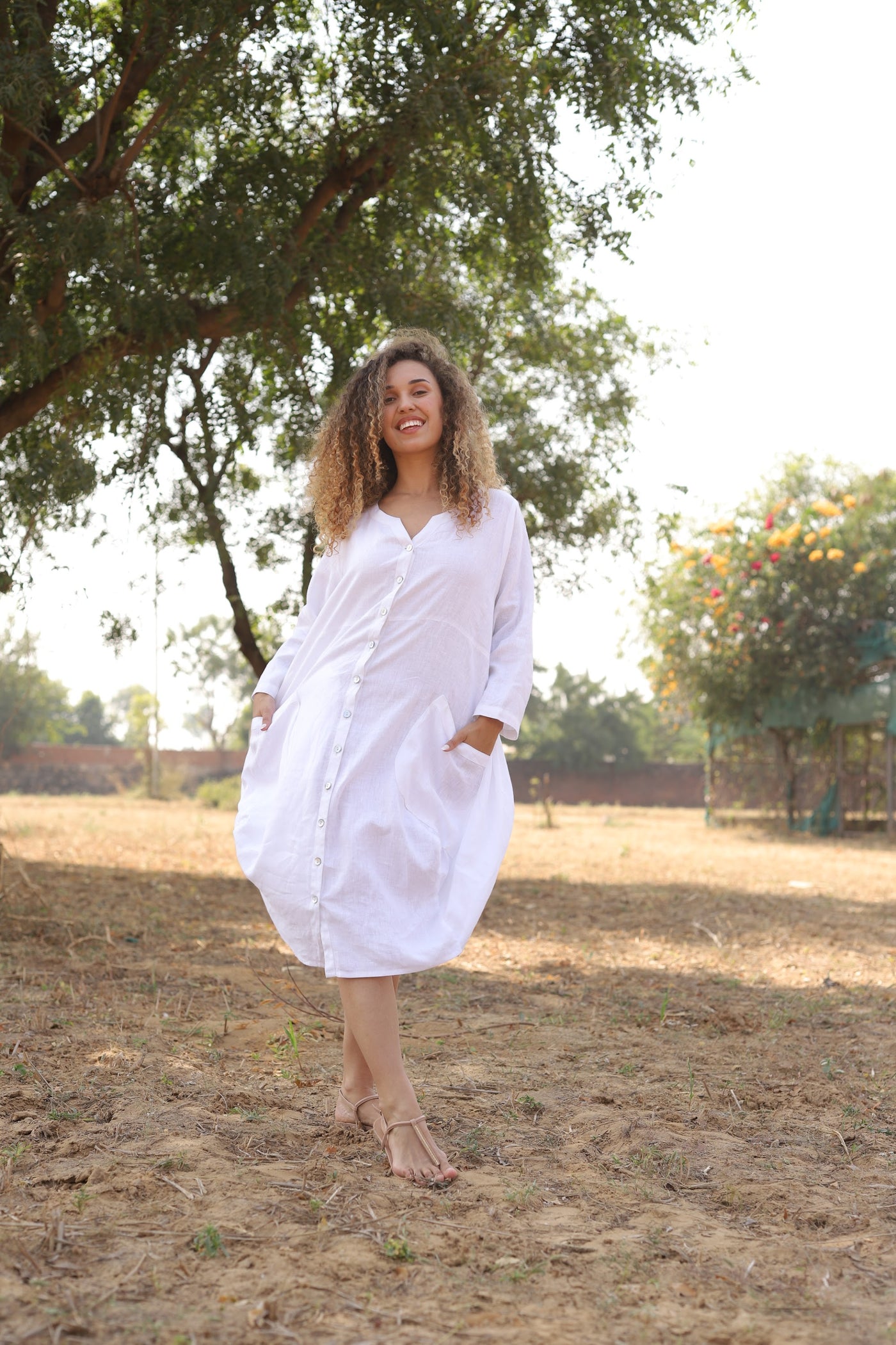 White oversized linen shirt dress in washed linen, photographed in Jaipur