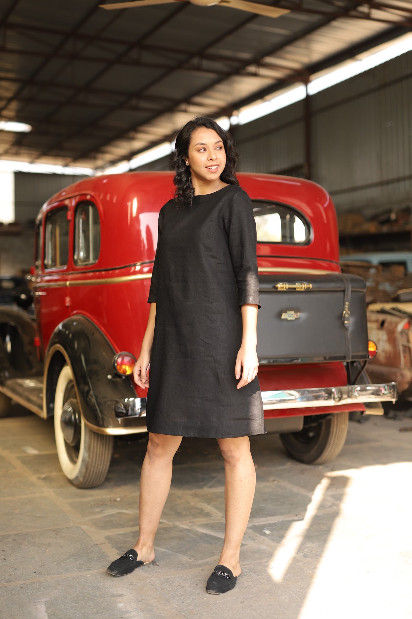 Charcoal sleeveless linen shift dress in washed linen, photographed in Jaipur