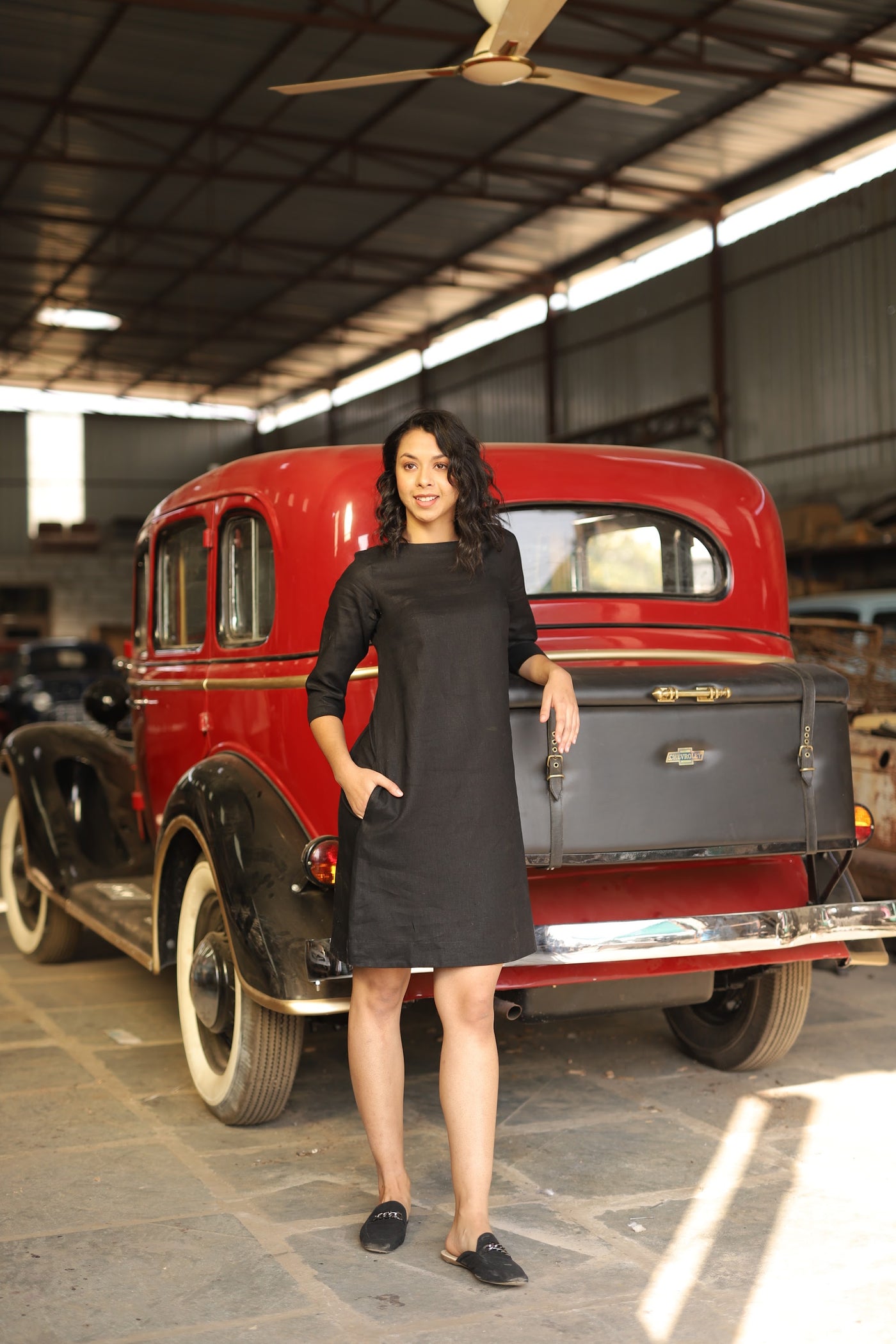 Charcoal sleeveless linen shift dress in washed linen, photographed in Jaipur