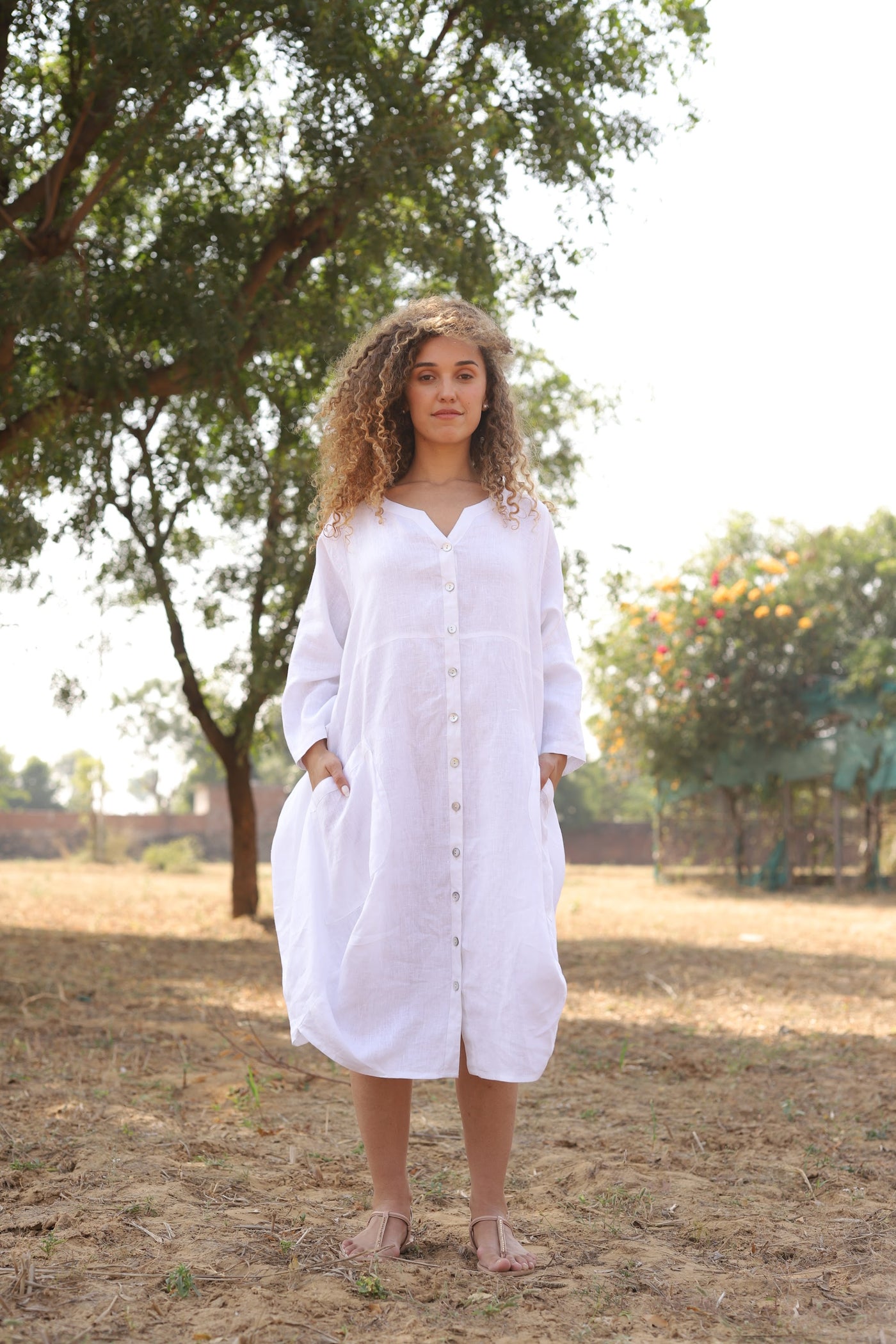 White oversized linen shirt dress in washed linen, photographed in Jaipur