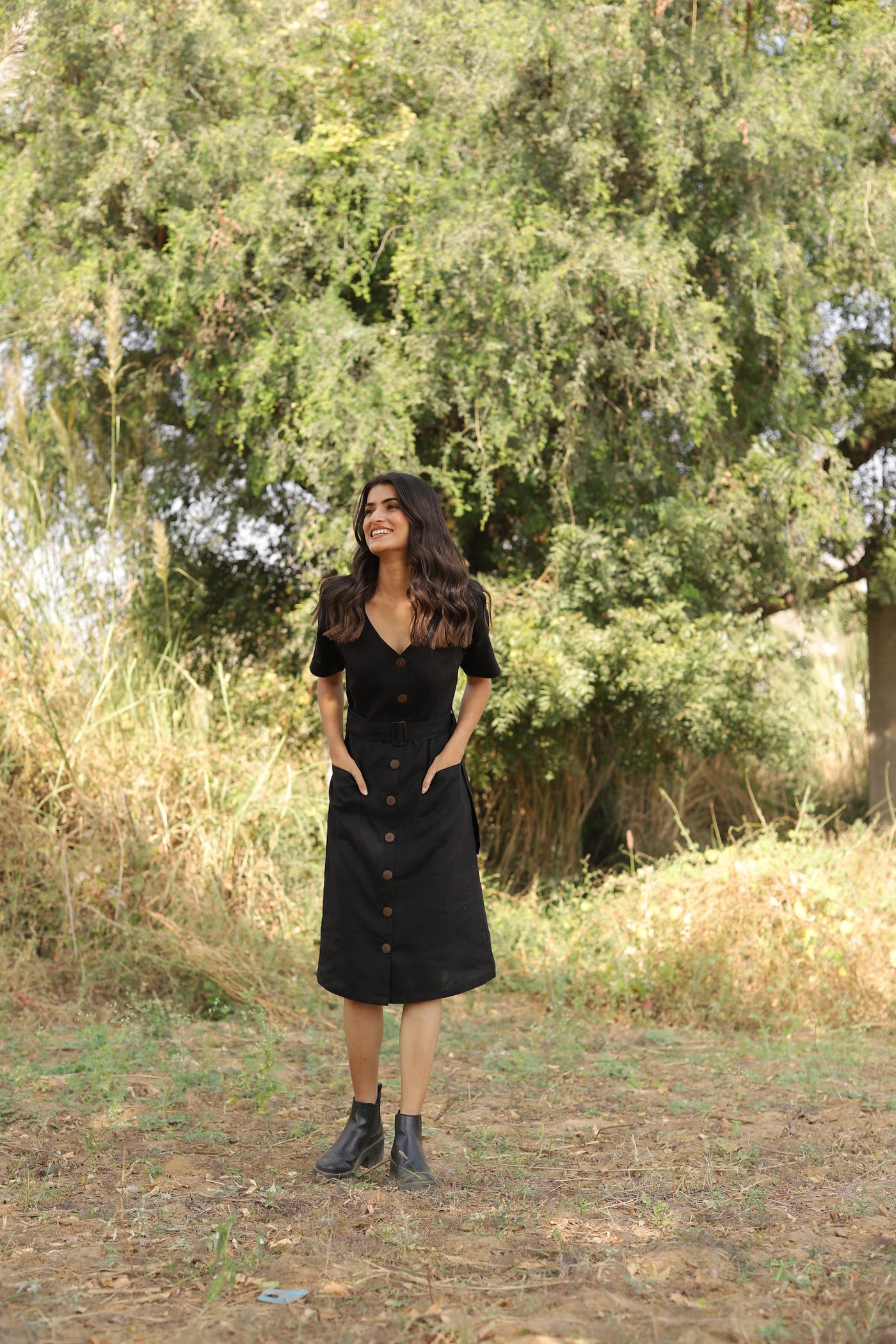 Black belted button front midi in washed linen, photographed in Jaipur