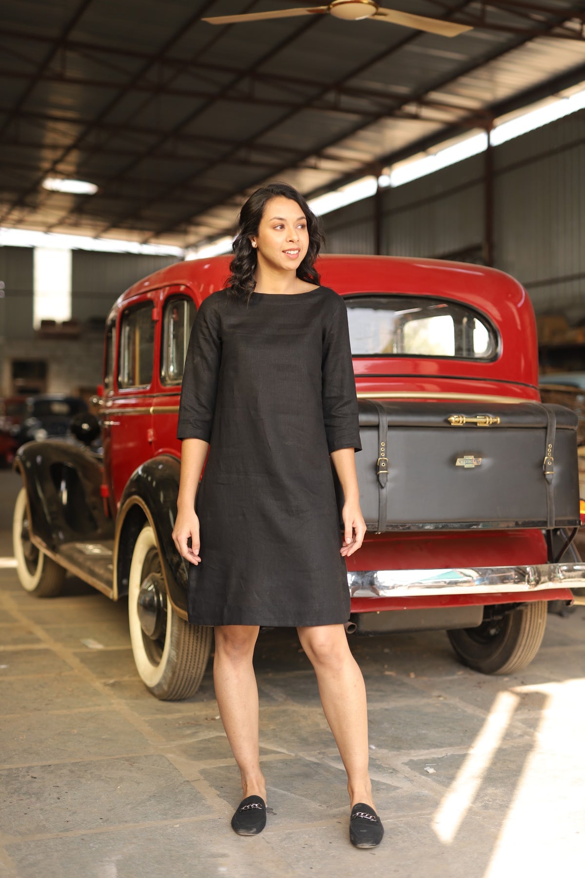 Charcoal sleeveless linen shift dress in washed linen, photographed in Jaipur