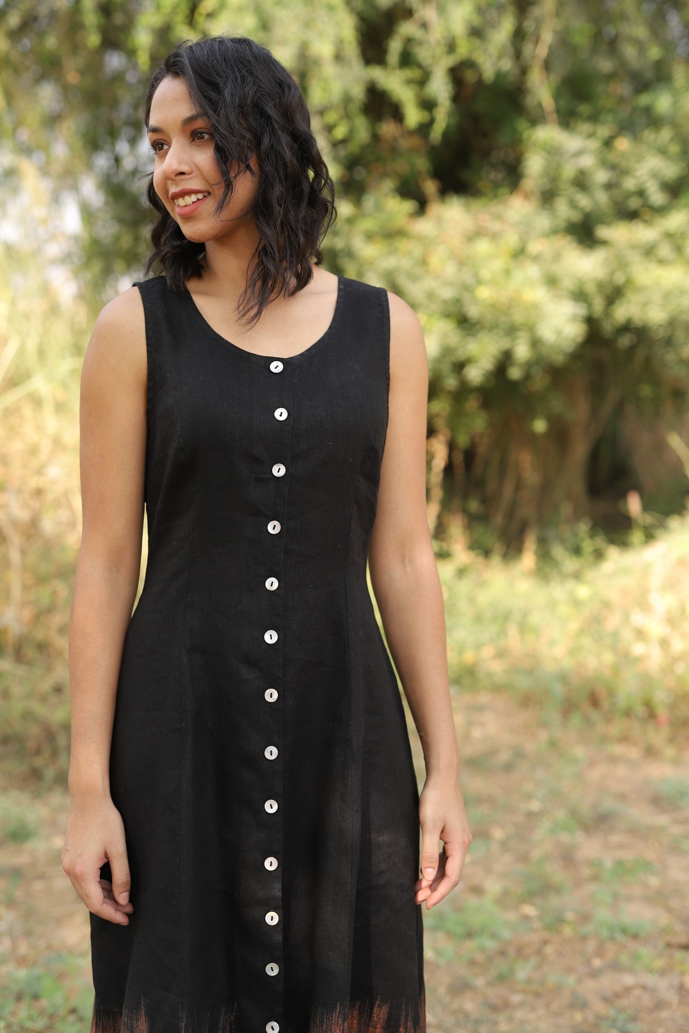 Black button front linen midi in washed linen, photographed in Jaipur