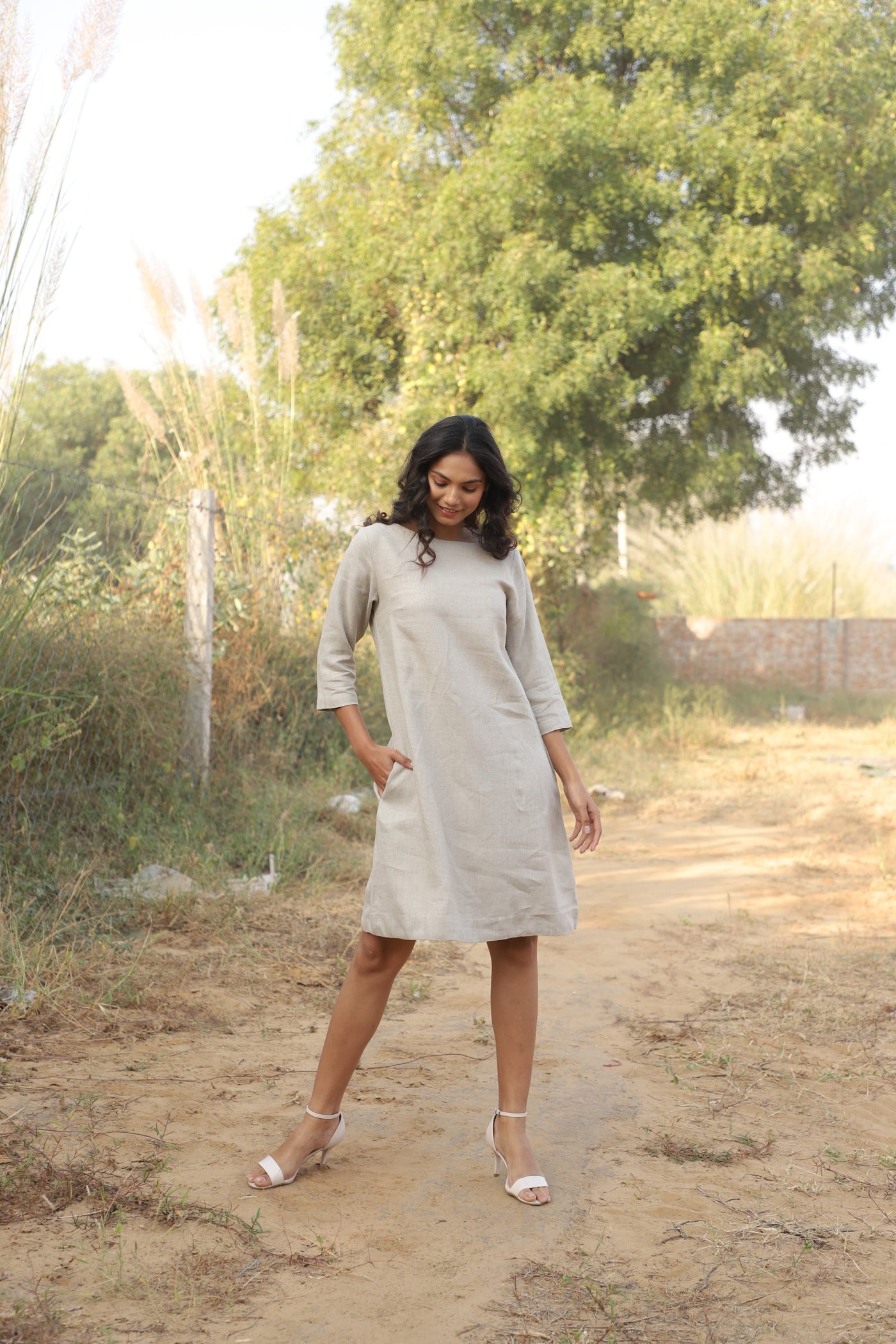 Oatmeal boat neck linen shift in washed linen, photographed in Jaipur