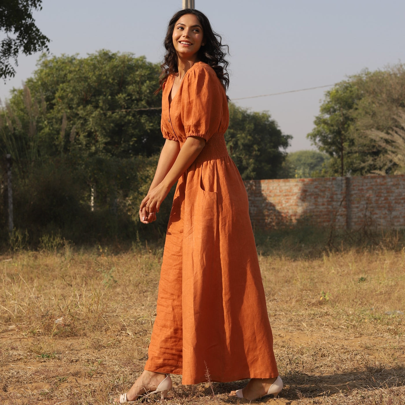 Terracotta button front linen maxi dress in washed linen, photographed in Jaipur