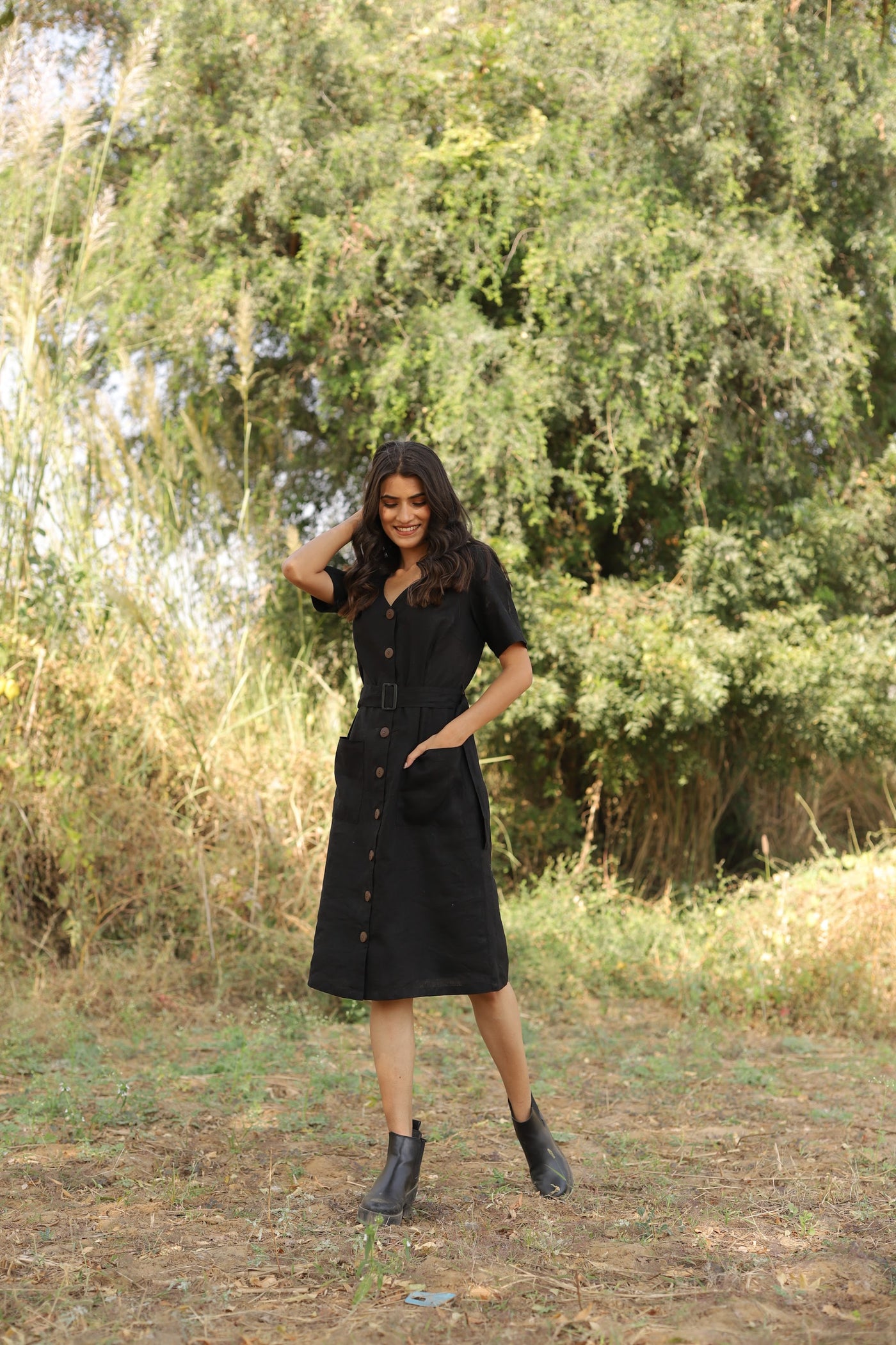 Black belted button front midi in washed linen, photographed in Jaipur