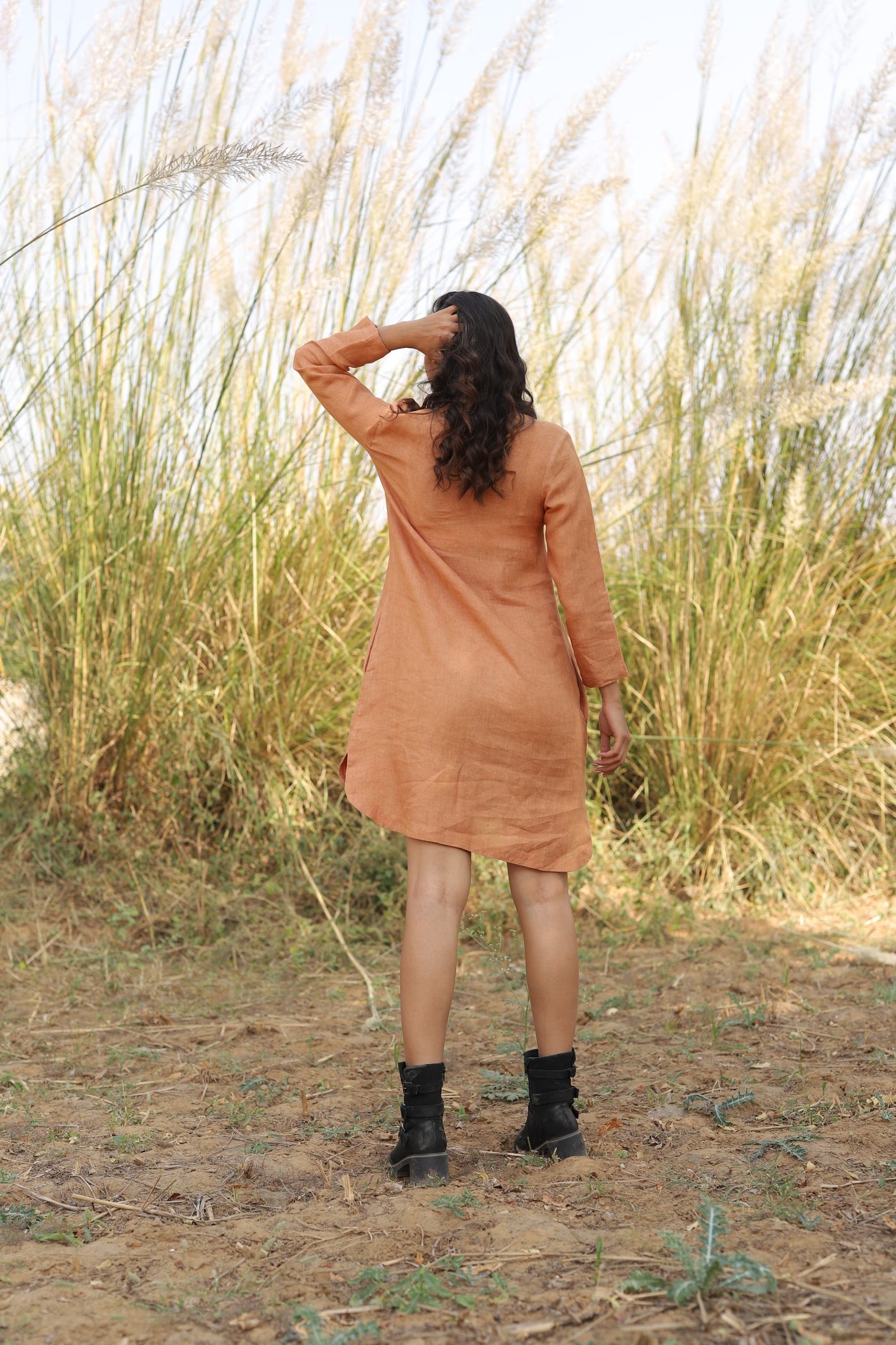 Terracotta long sleeve linen tunic in washed linen, photographed in Jaipur