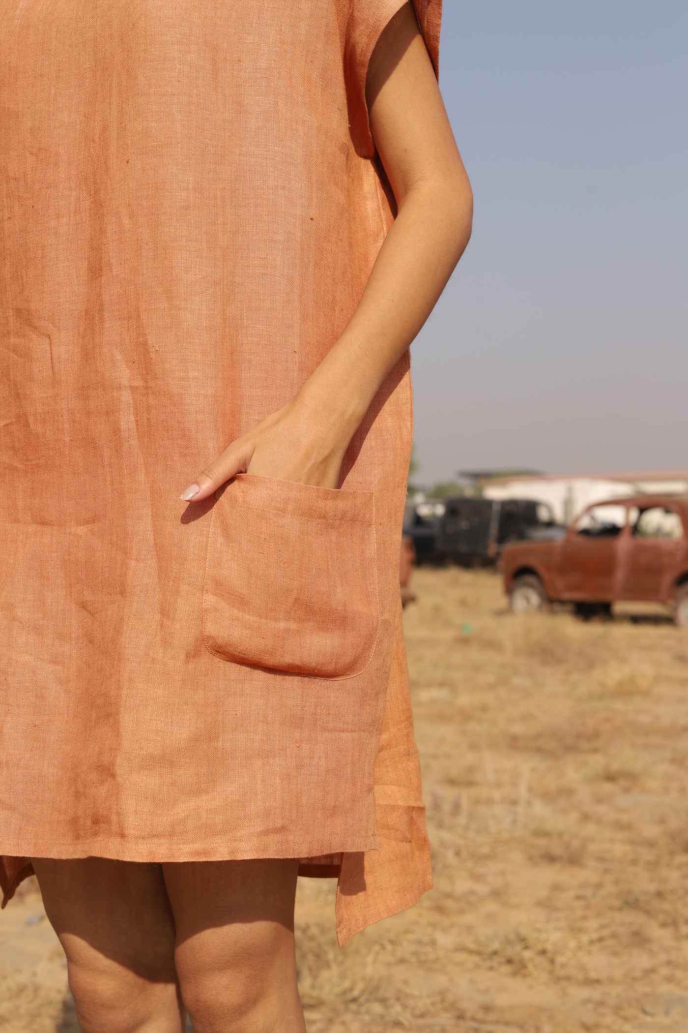 Apricot boxy linen shift in washed linen, photographed in Jaipur