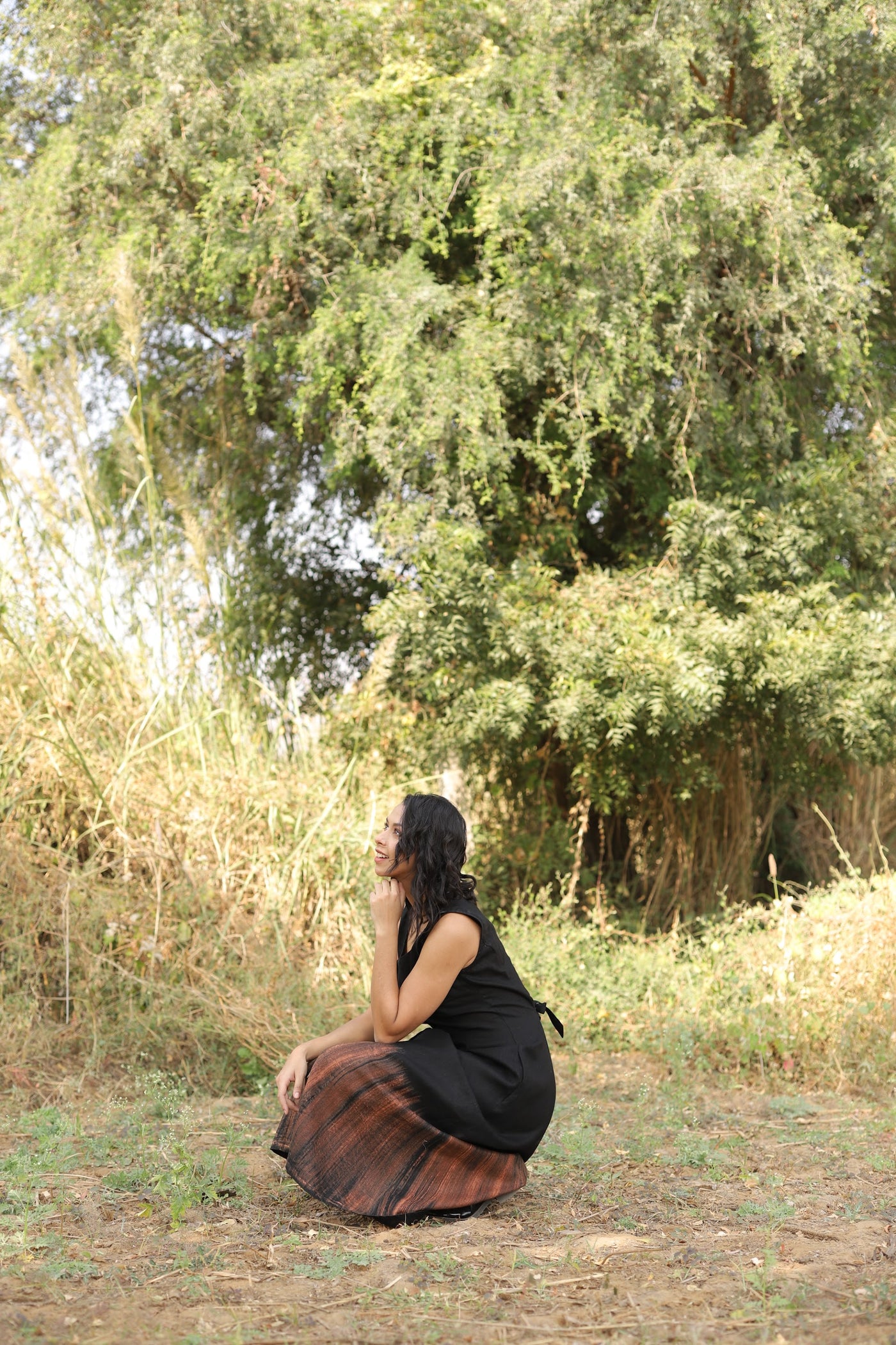 Black button front linen midi in washed linen, photographed in Jaipur