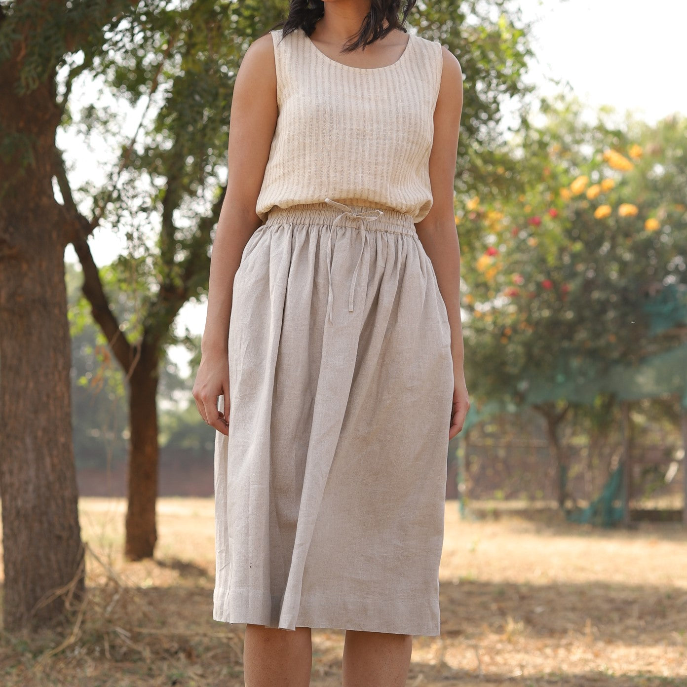 Natural gathered linen midi skirt in washed linen, photographed in Jaipur