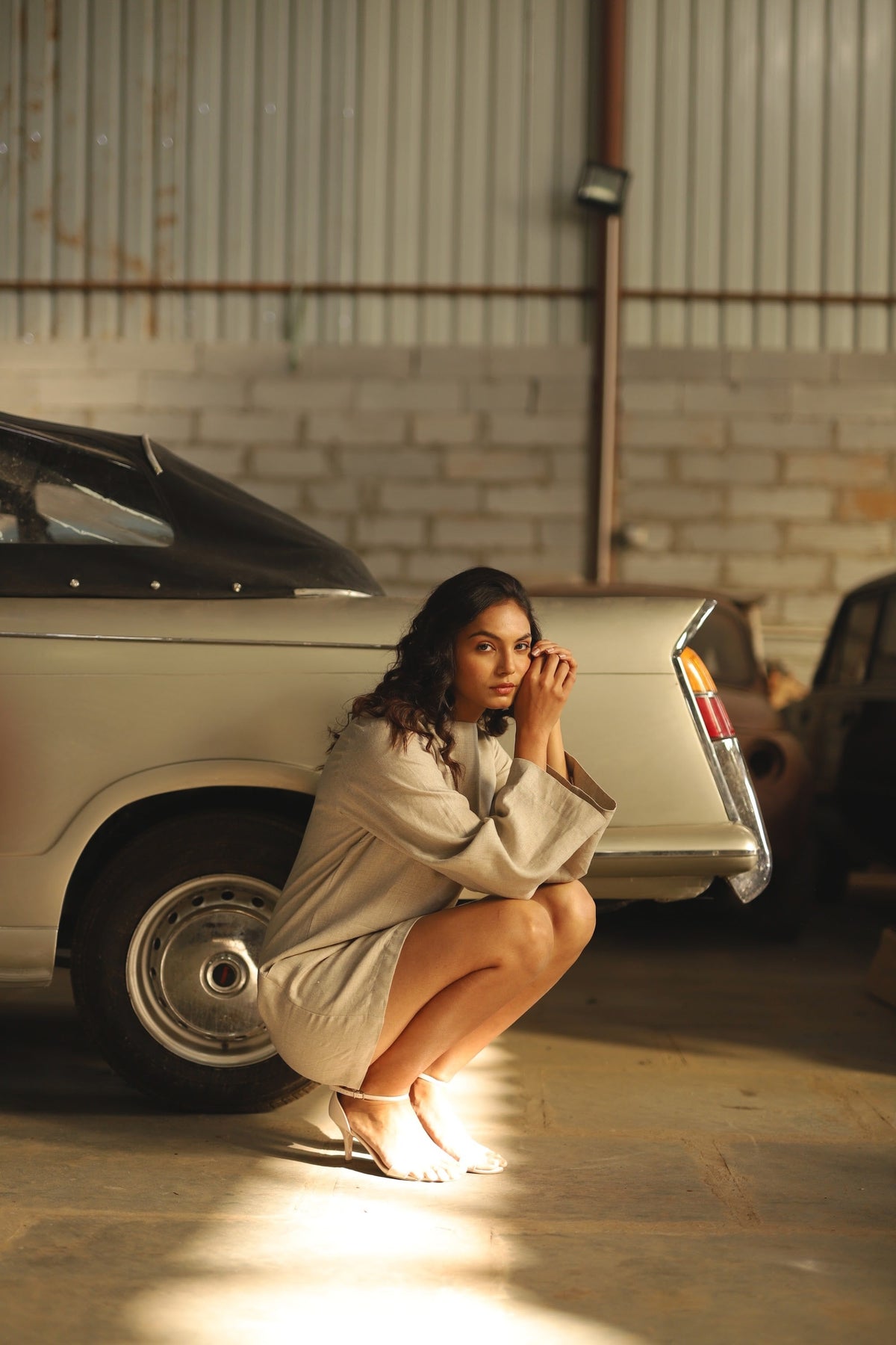 Sand oversized linen mini dress in washed linen, photographed in Jaipur