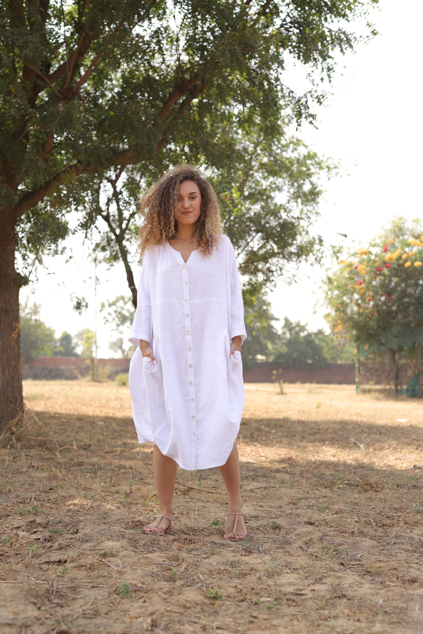 White oversized linen shirt dress in washed linen, photographed in Jaipur