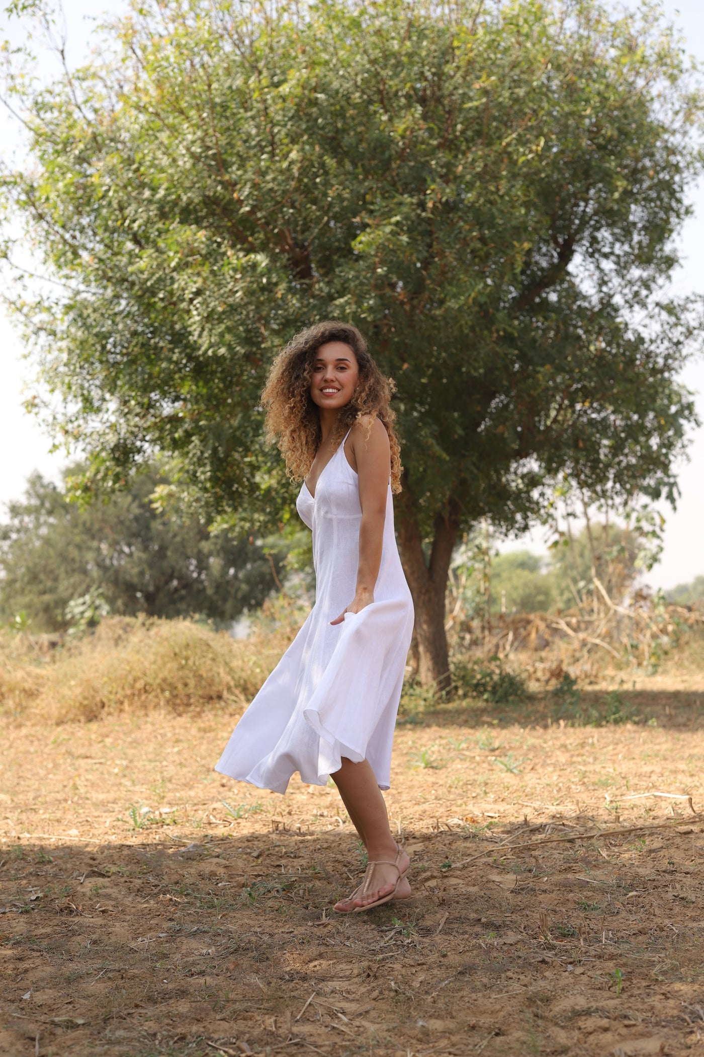 White strappy linen sundress in washed linen, photographed in Jaipur