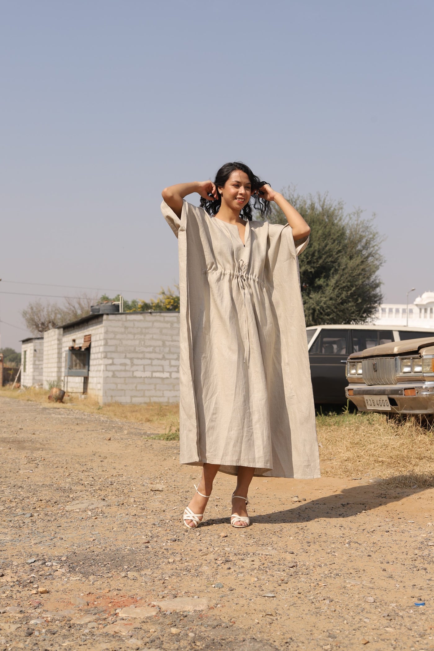 Natural drawstring linen kaftan in washed linen, photographed in Jaipur