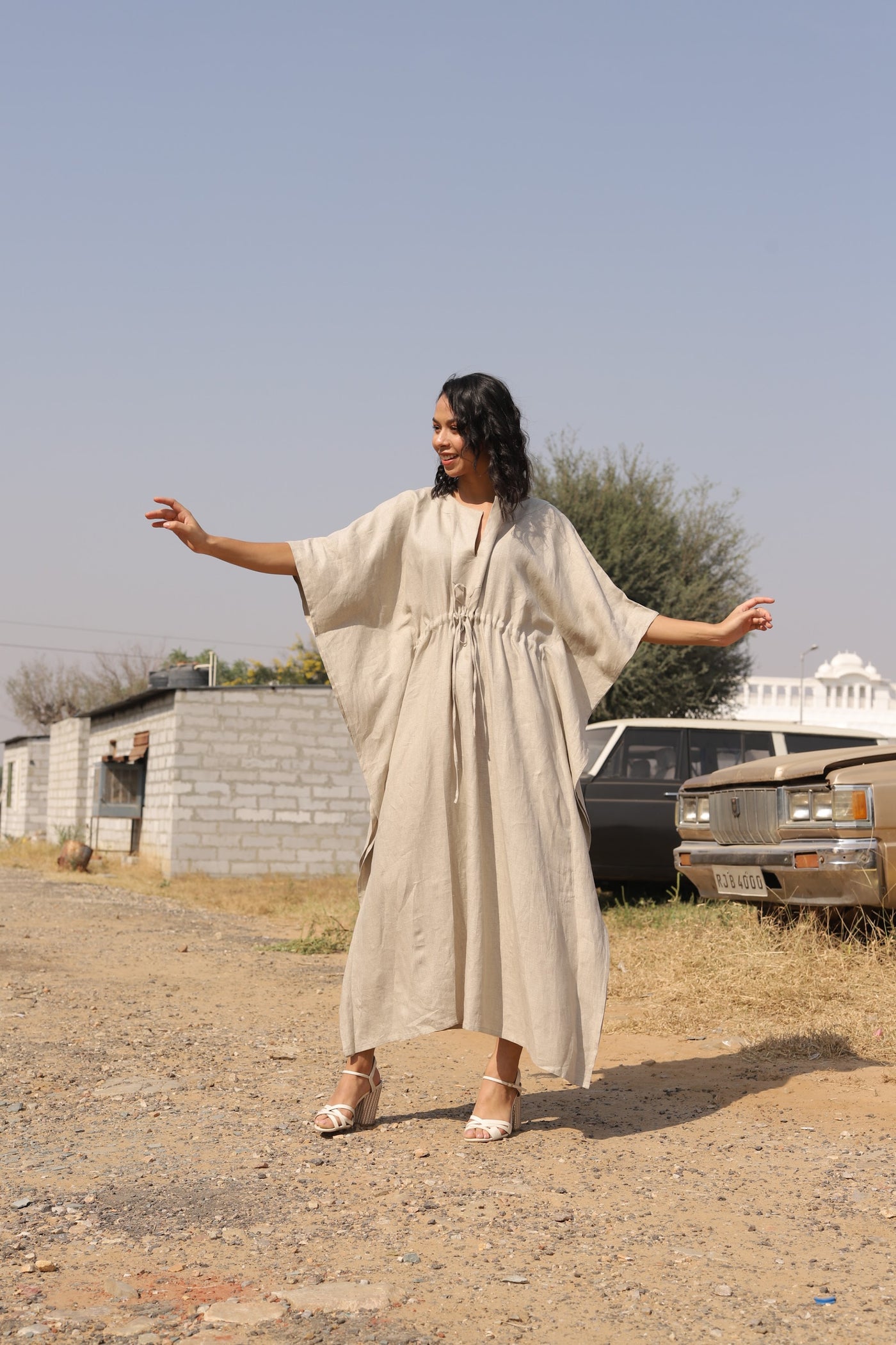 Natural drawstring linen kaftan in washed linen, photographed in Jaipur