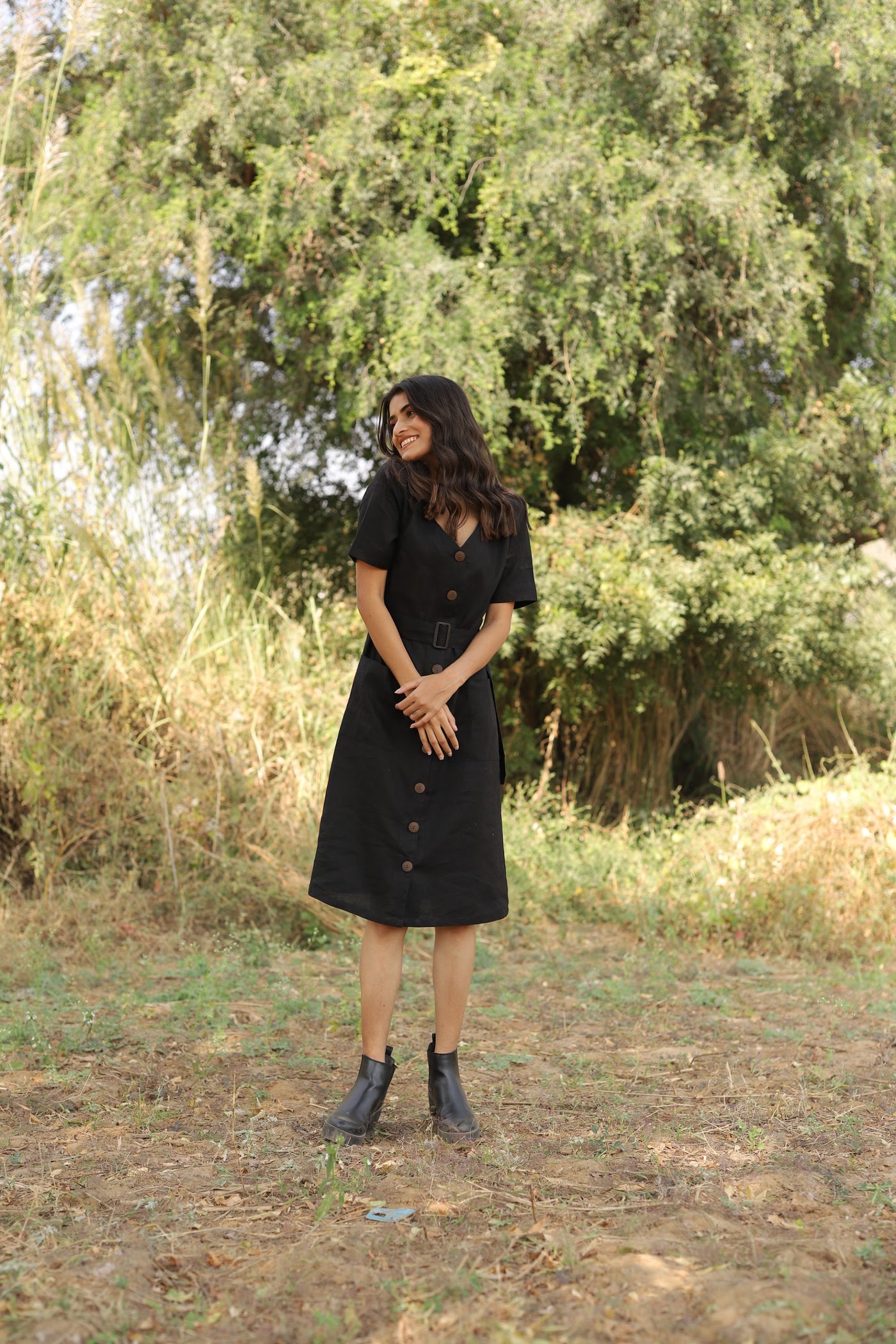 Black belted button front midi in washed linen, photographed in Jaipur