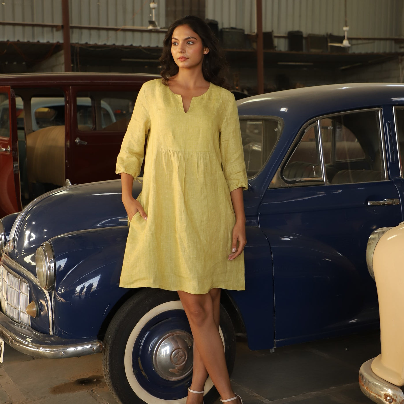 Chartreuse gathered yoke linen dress in washed linen, photographed in Jaipur