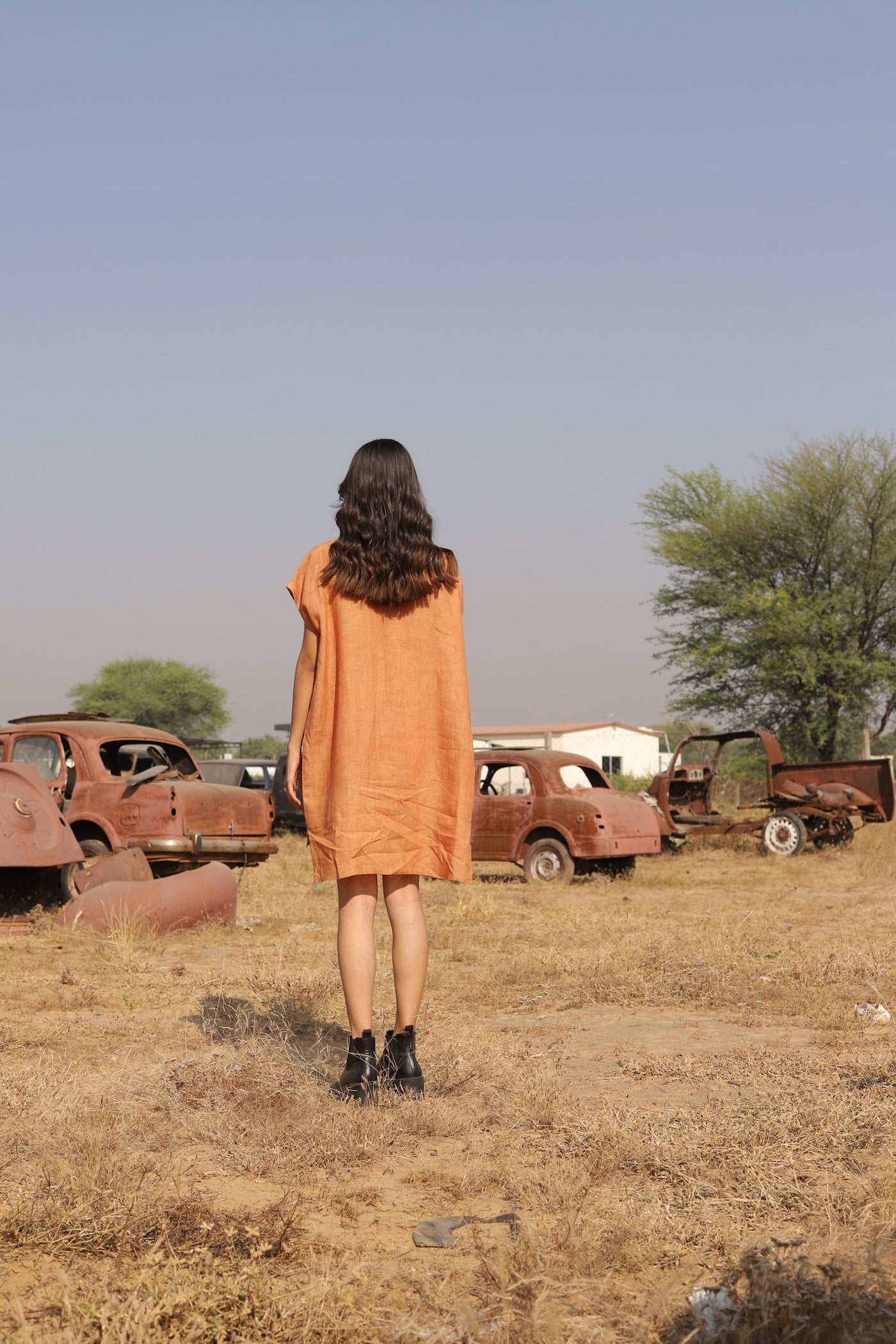 Apricot boxy linen shift in washed linen, photographed in Jaipur