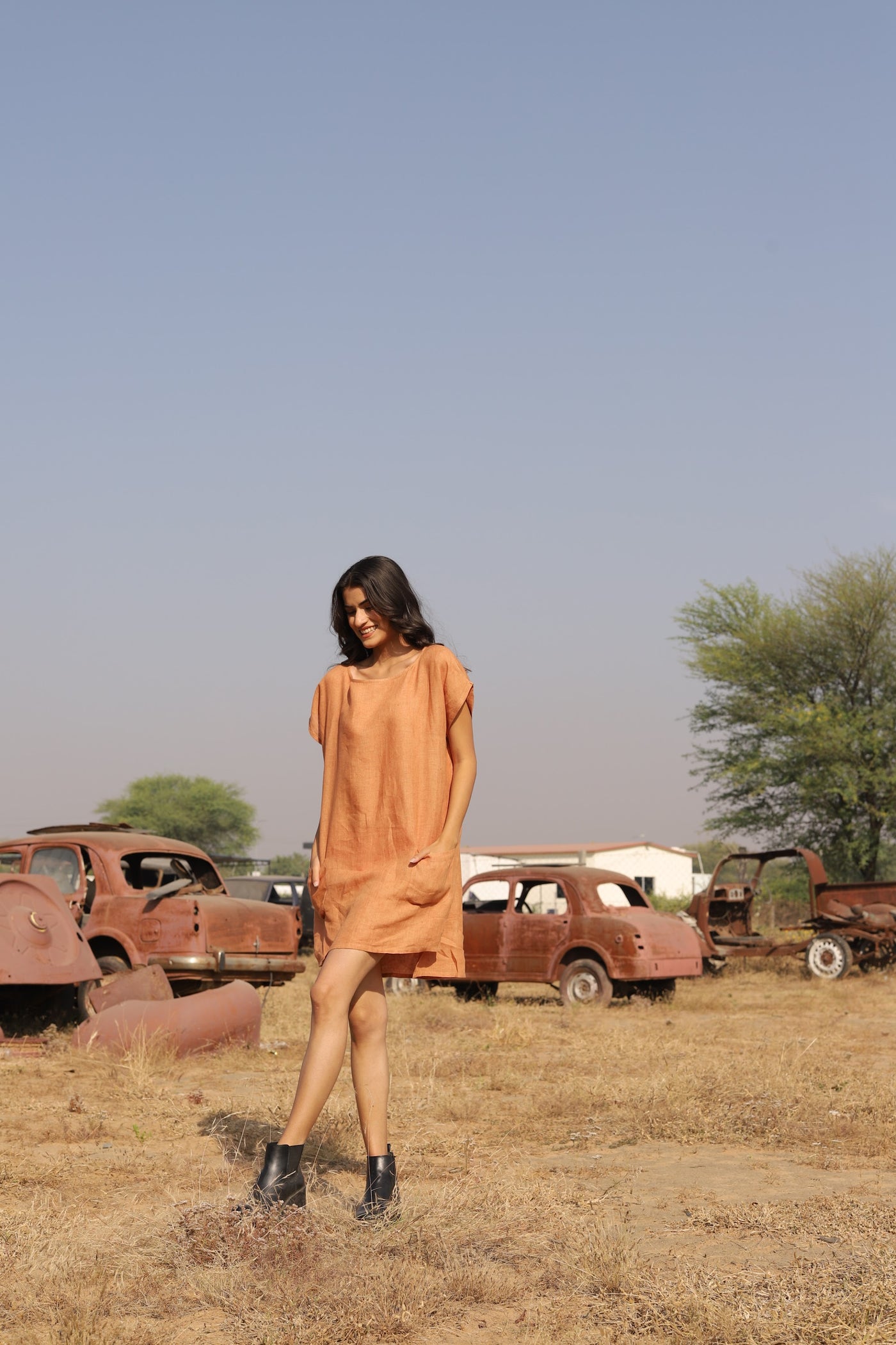 Apricot boxy linen shift in washed linen, photographed in Jaipur