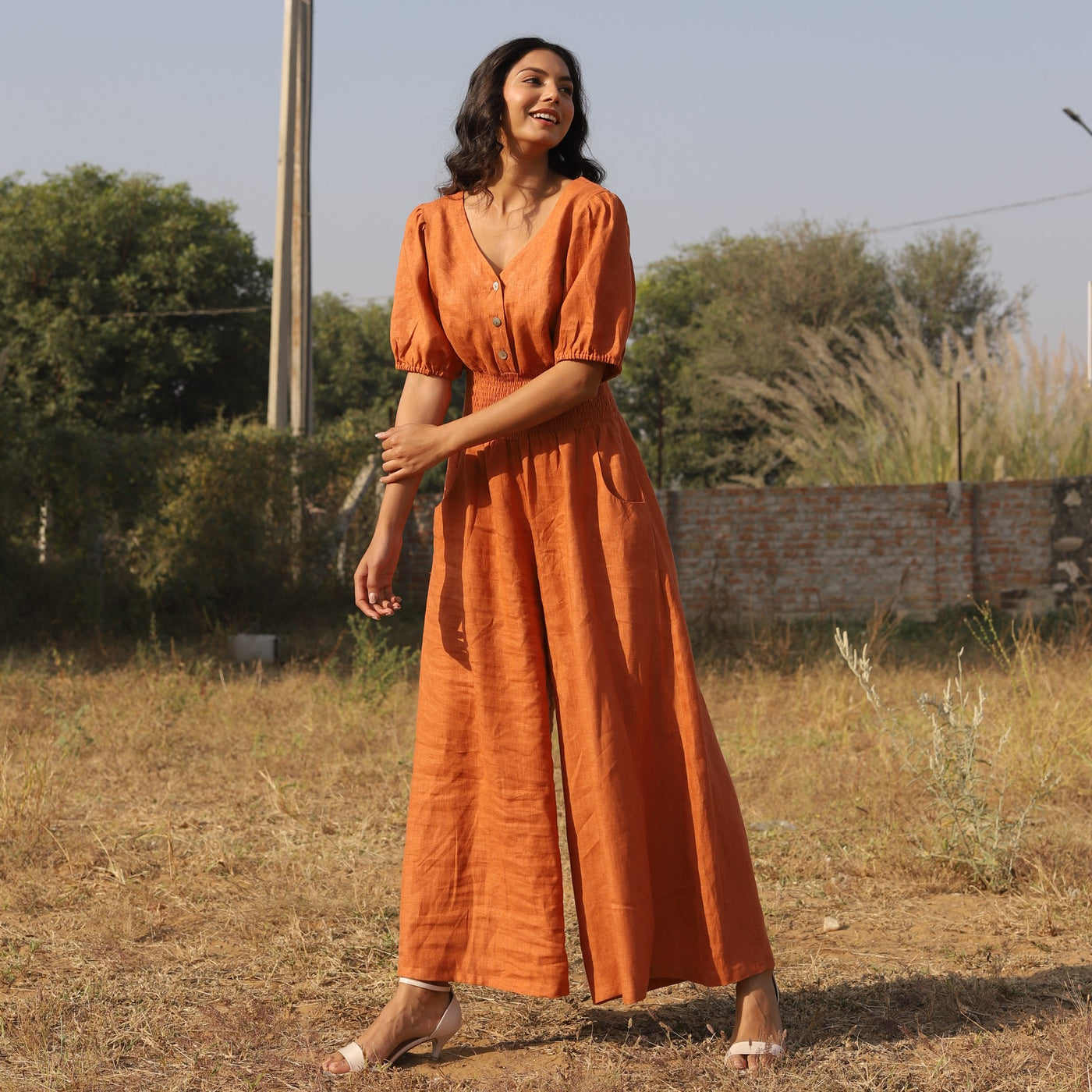 Terracotta button front linen maxi dress in washed linen, photographed in Jaipur