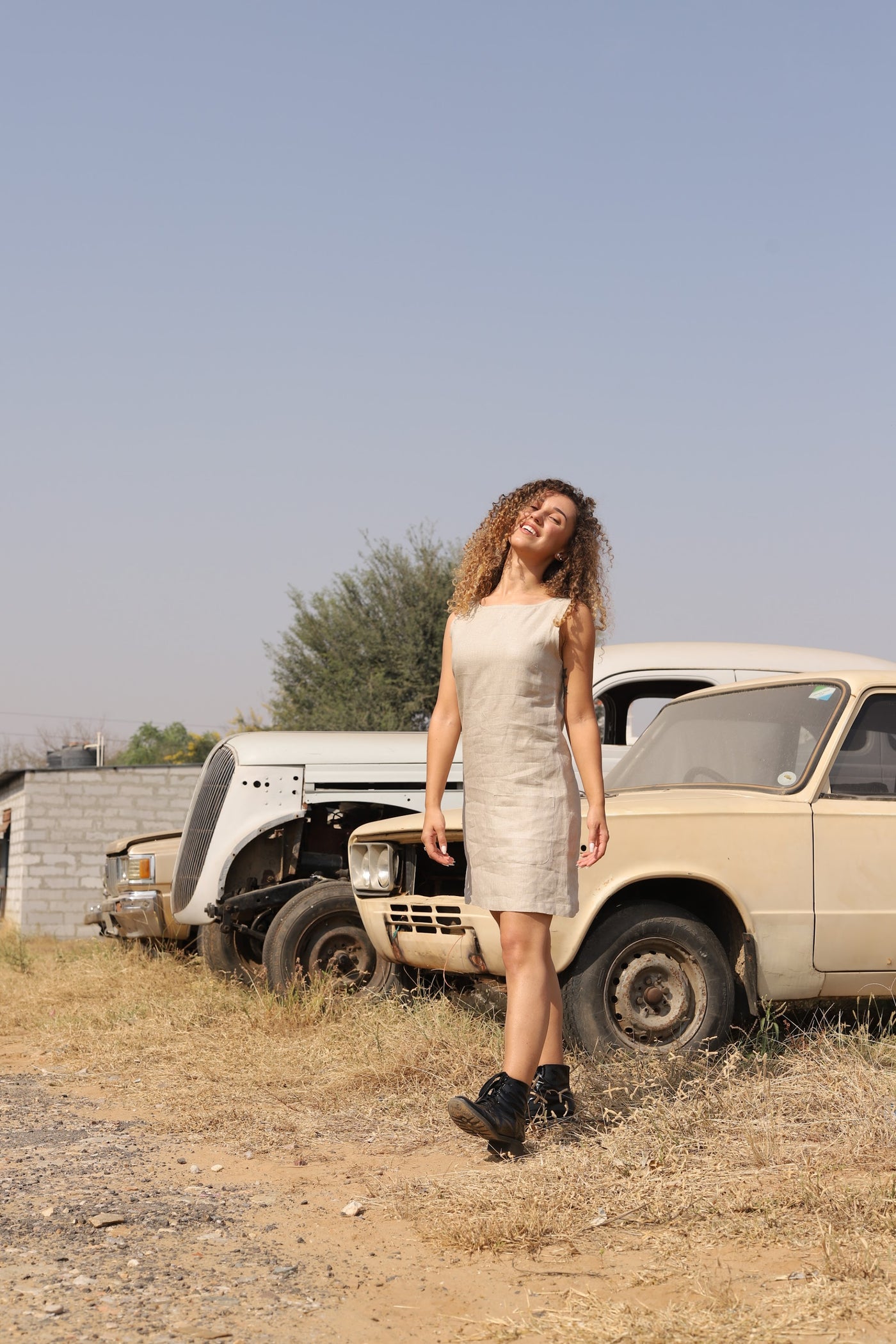 Natural sleeveless linen shift in washed linen, photographed in Jaipur