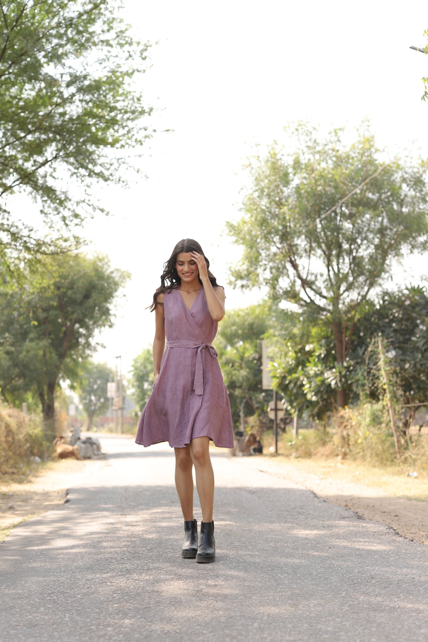 Mauve sleeveless wrap midi dress in washed linen, photographed in Jaipur