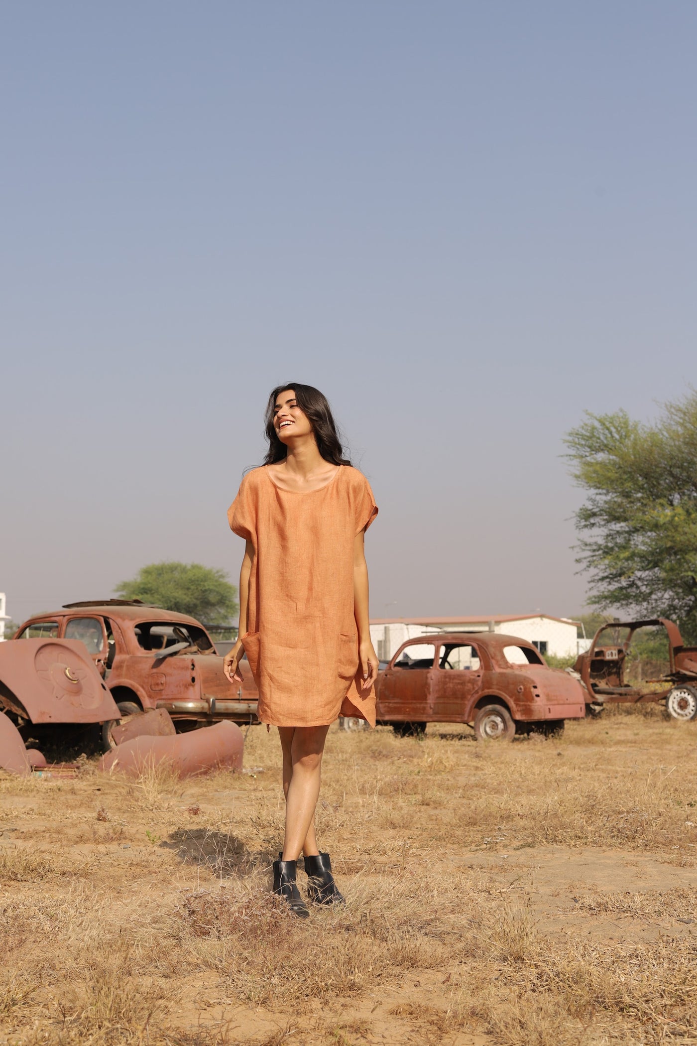 Apricot boxy linen shift in washed linen, photographed in Jaipur