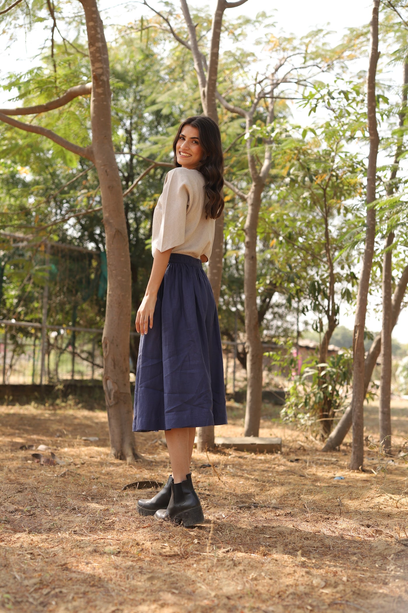 Navy gathered linen midi skirt in washed linen, photographed in Jaipur