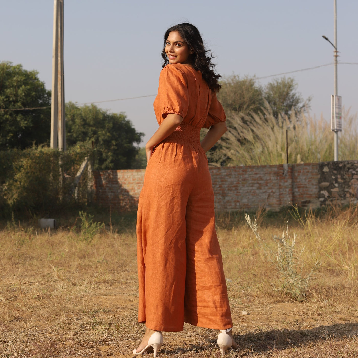 Terracotta button front linen maxi dress in washed linen, photographed in Jaipur