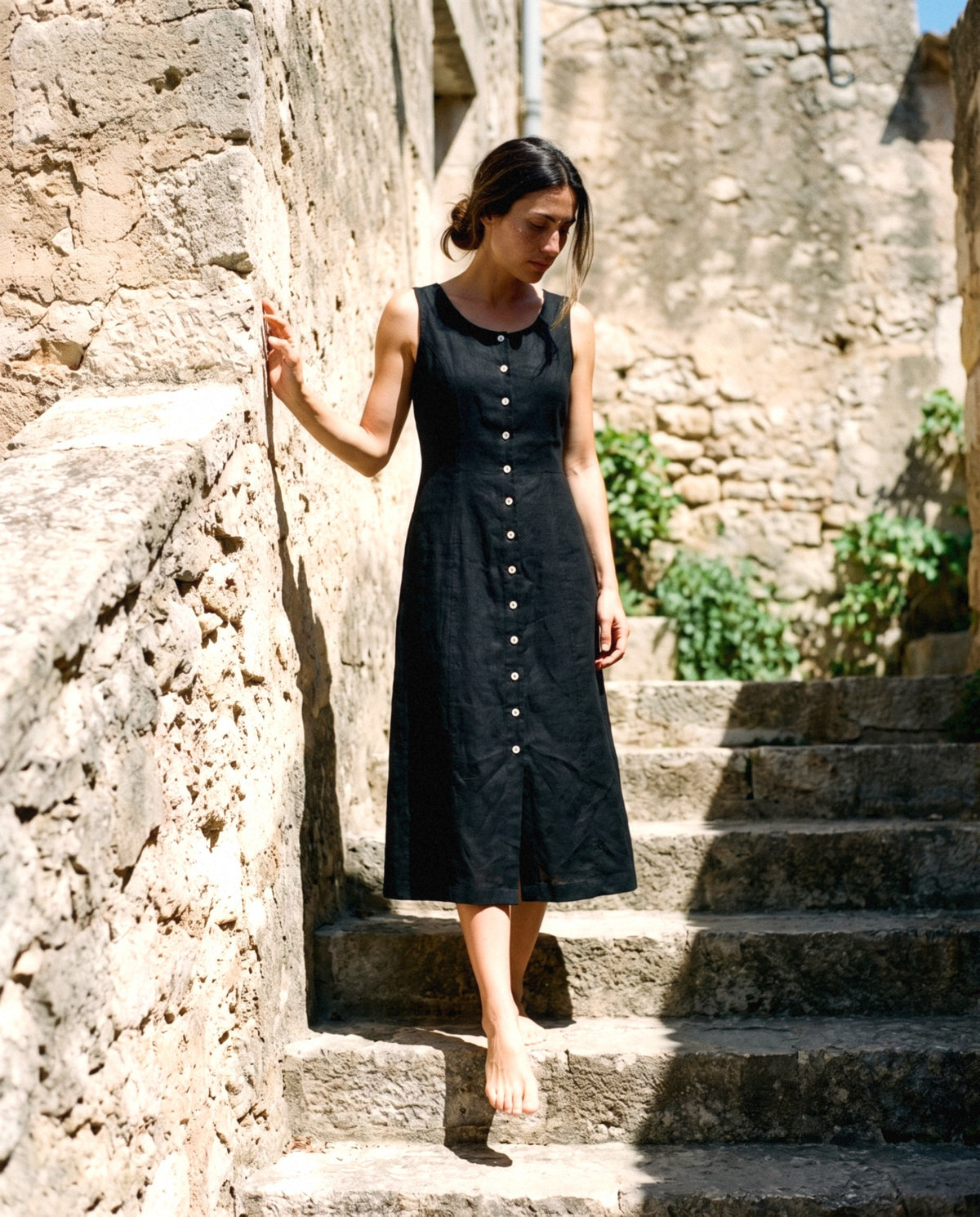 Button Front Linen Midi in black, worn outdoors