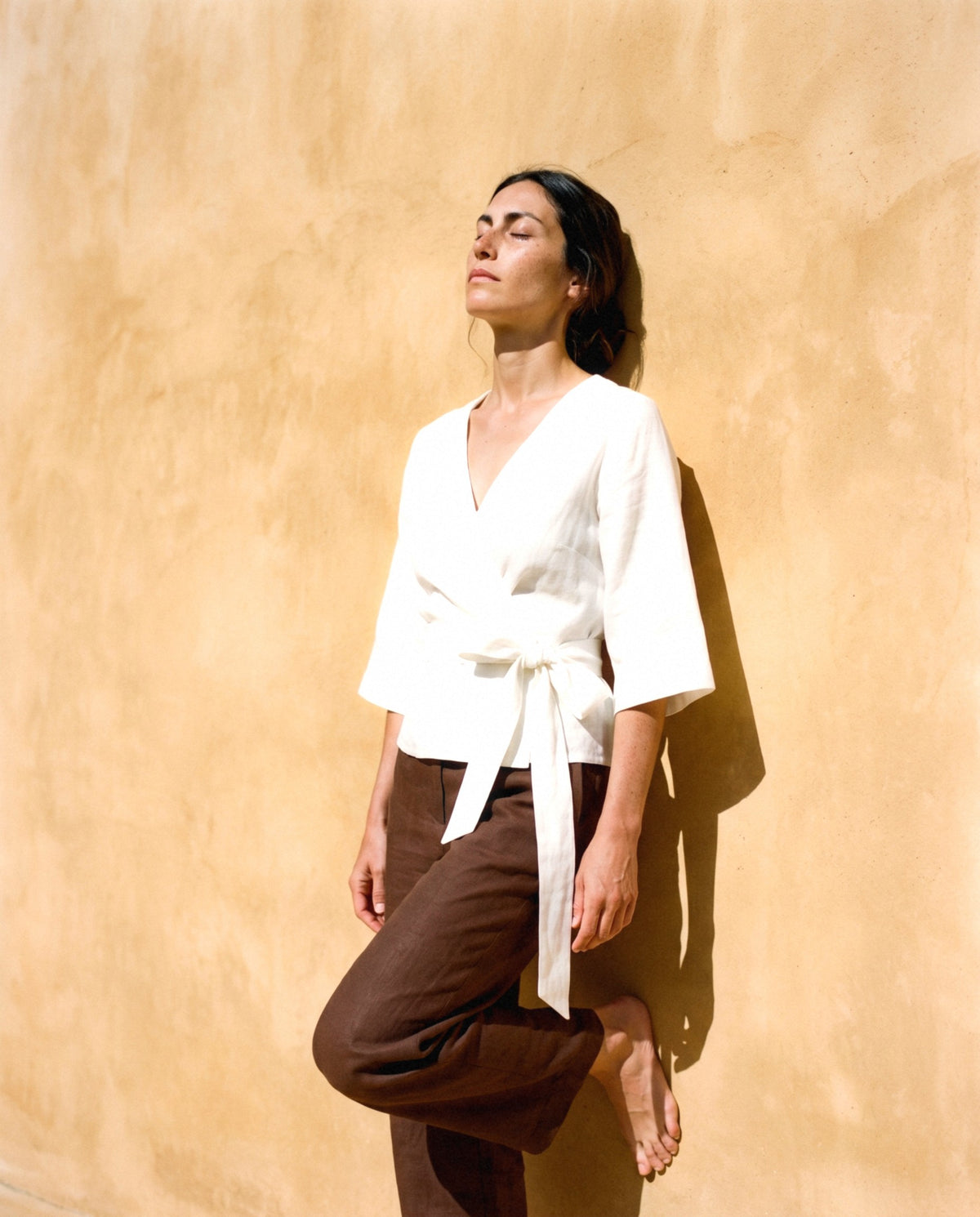 Lucia Wrap Top, worn outdoors
