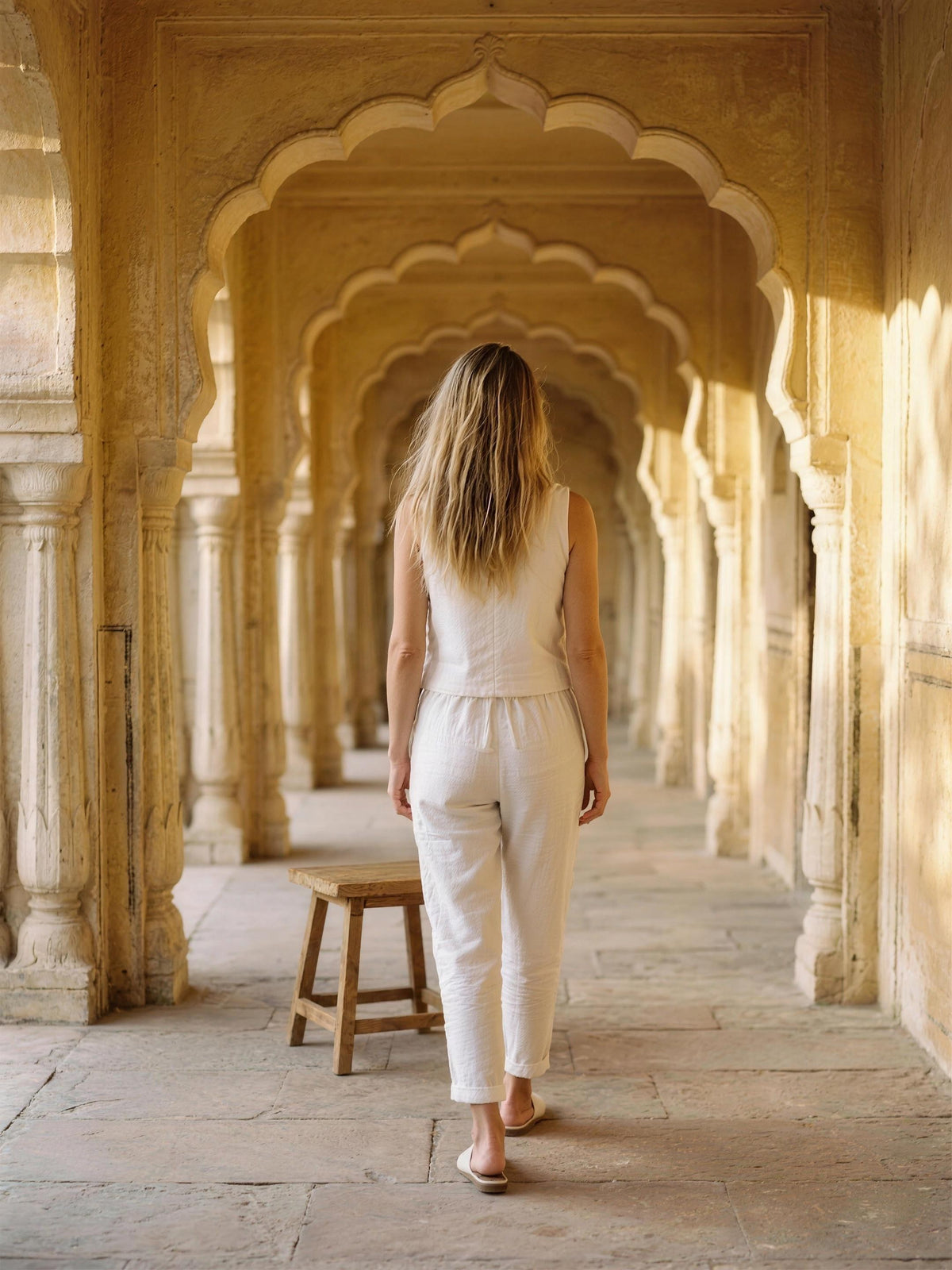 Flax linen waistcoat and tapered trousers photographed in a Jaipur haveli courtyard