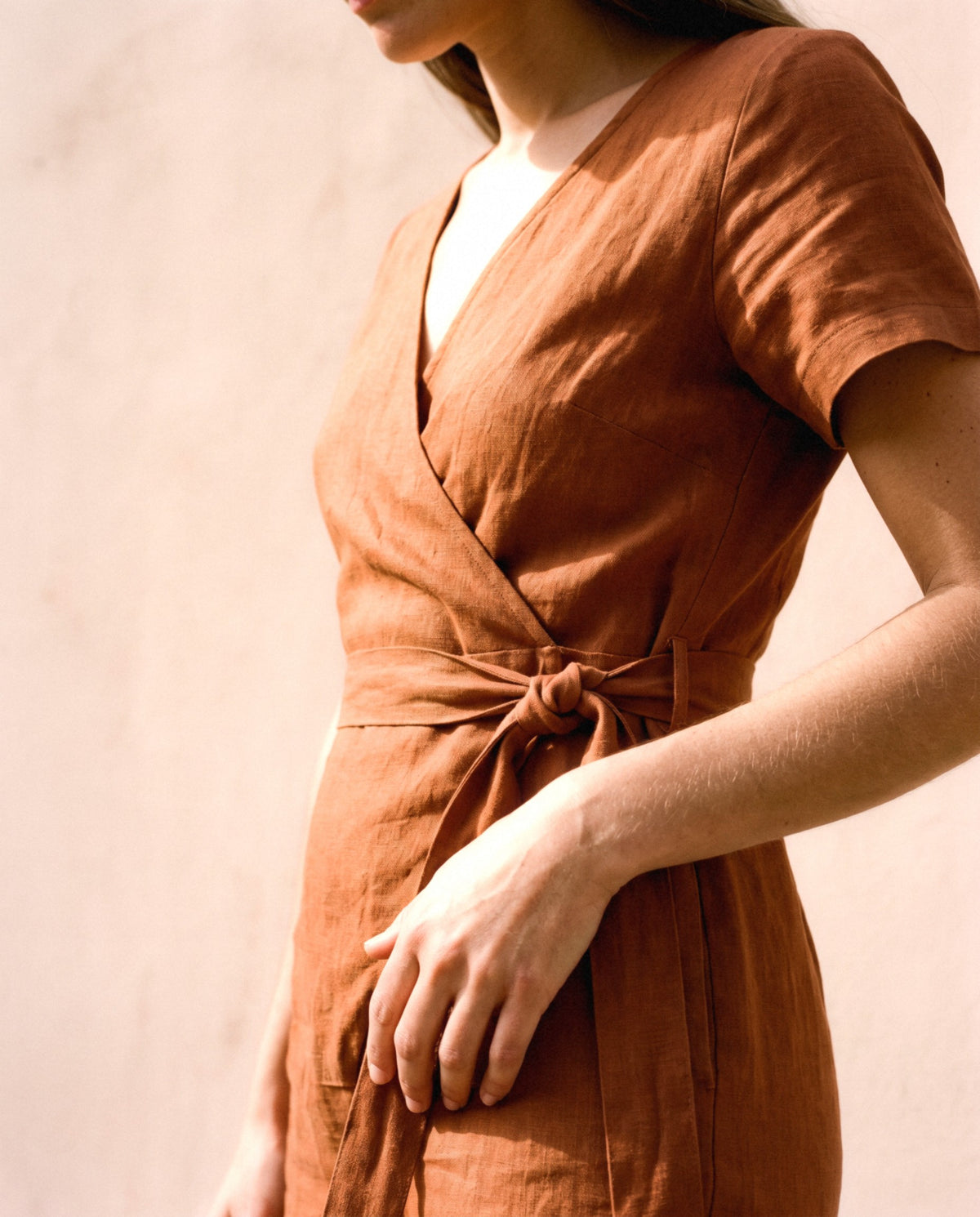 Wrap Linen Jumpsuit in cinnamon, fabric and finish detail