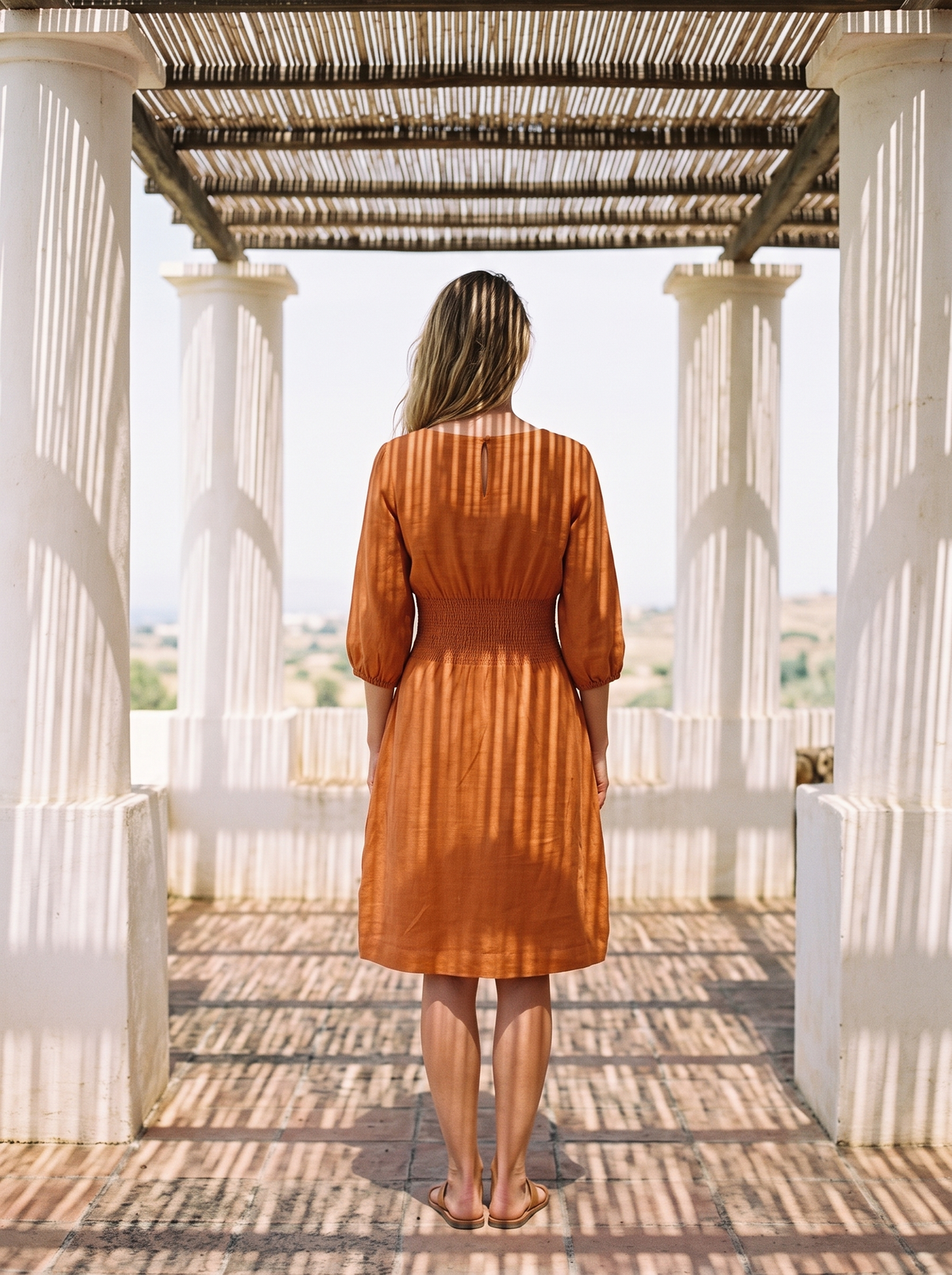 Boat Neck Smocked Linen Dress in orange linen